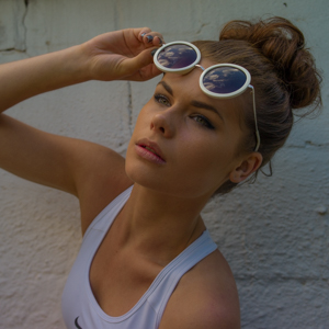 ../../_images/gina-underhill-lifting-sunglasses.jpg